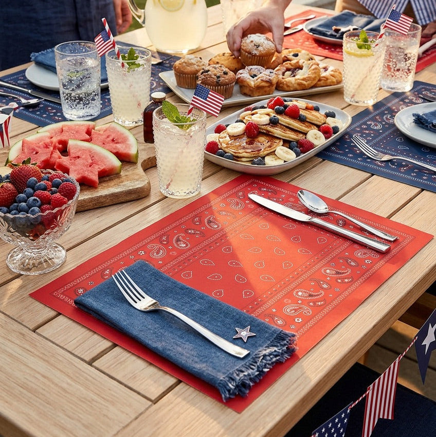 Outdoor dining table set for a casual meal with patriotic paper placemats