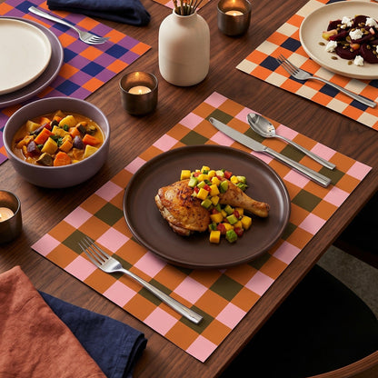 Set of plaid paper placemat on a modern table set for dinner. 