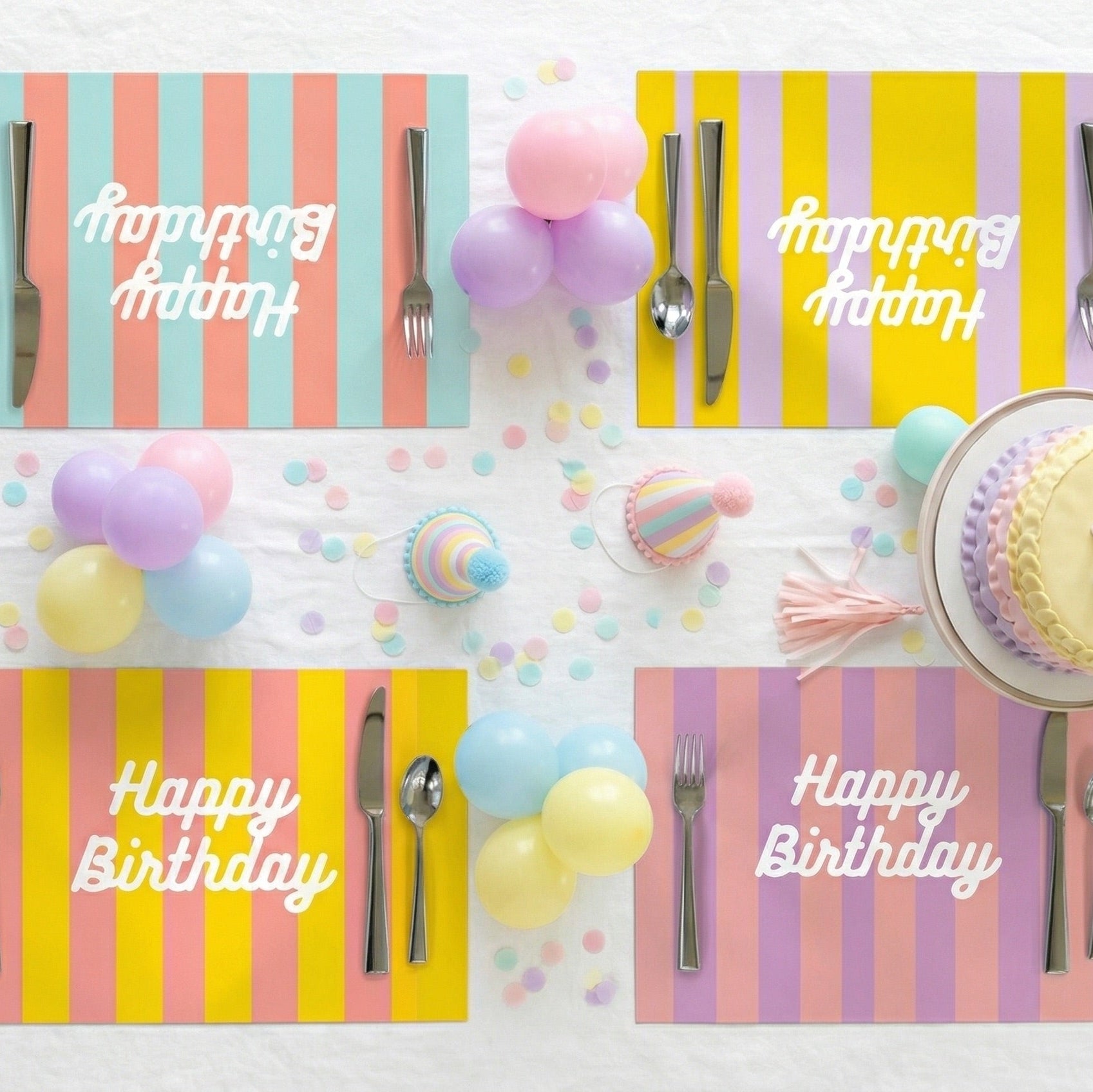 Set of 4 Happy Birthday paper placemats set for a birthday party.