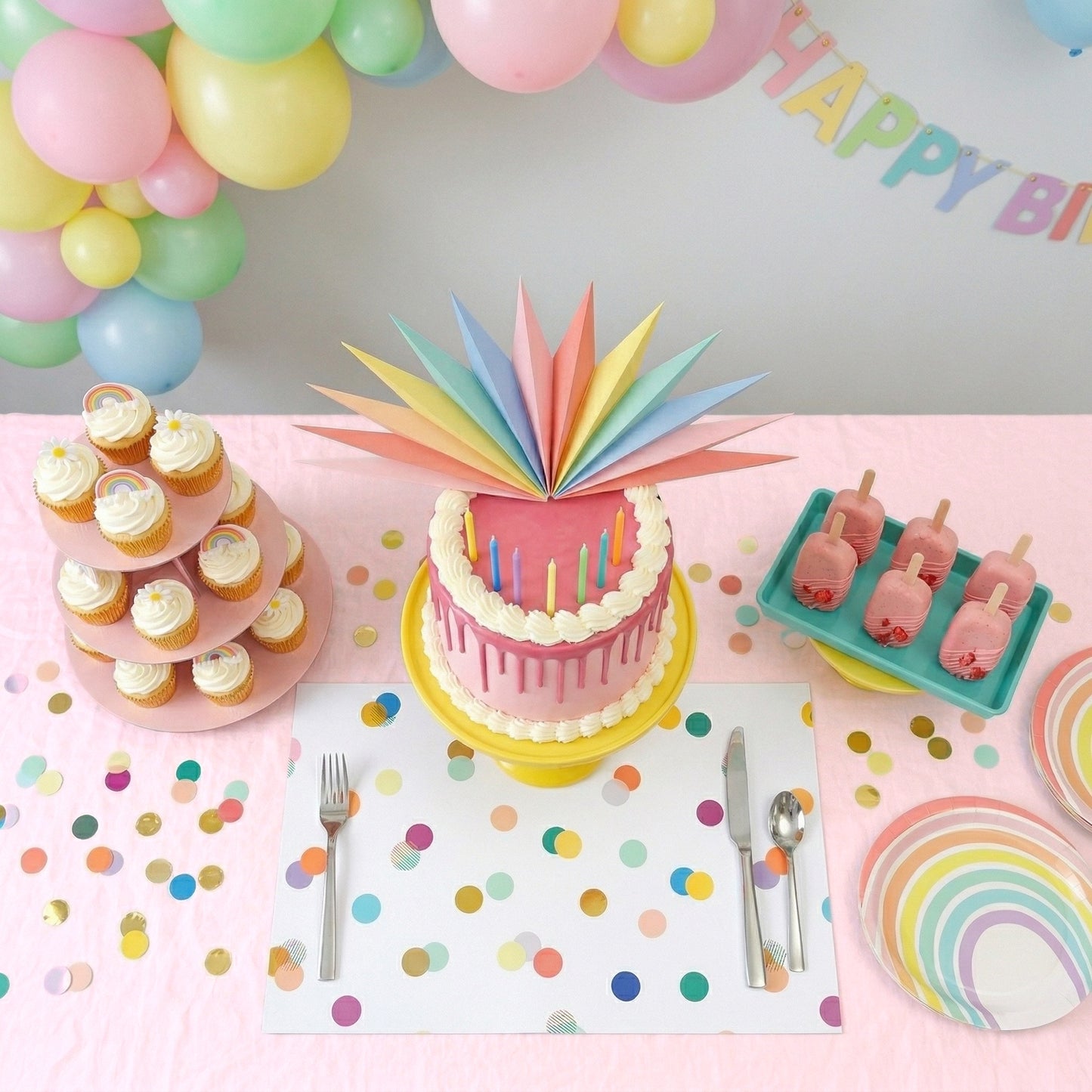 white paper placemat with colorful confetti pattern on a table set for a birthday party. 