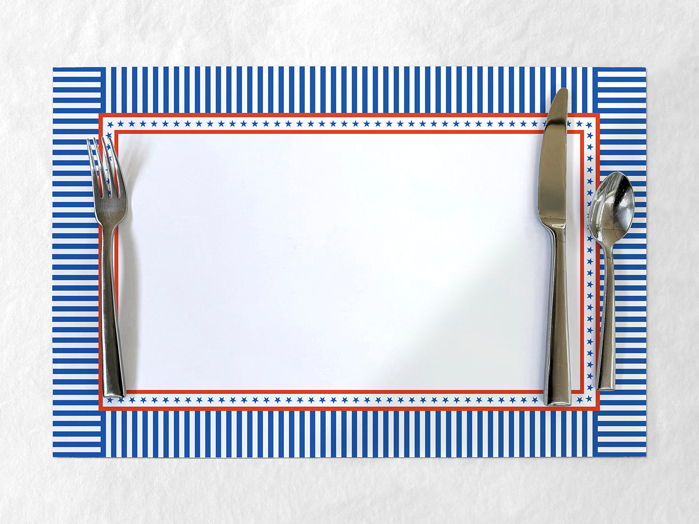 Placemat with blue and red striped border on a white surface