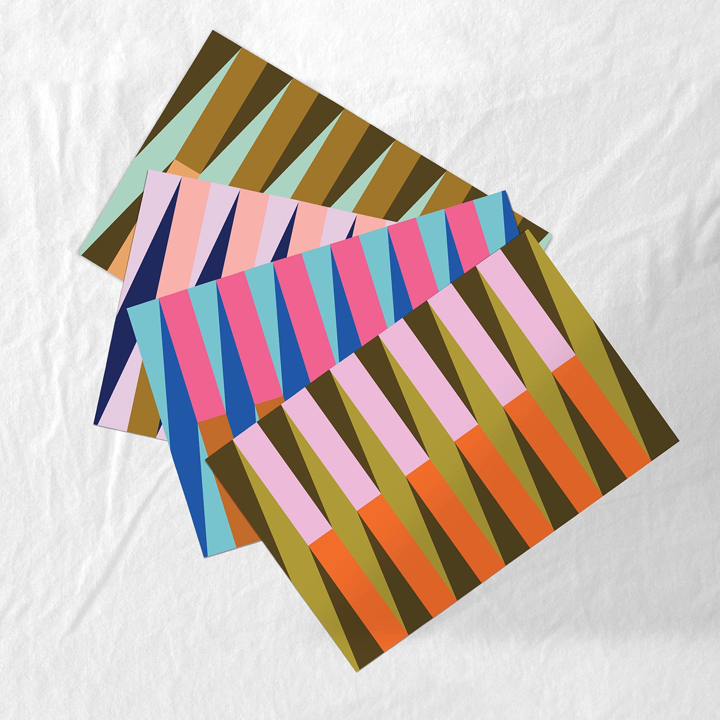 Colorful striped paper placemat set on a white background