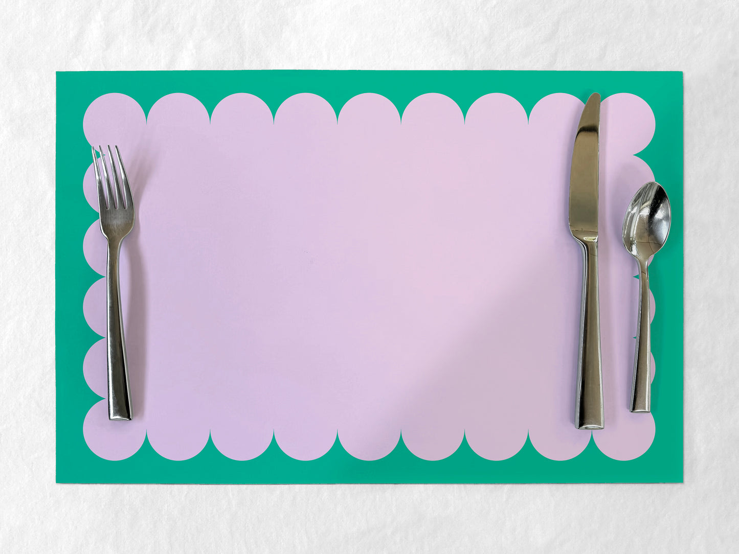 Paper placemat with scalloped edge, lavender and teal