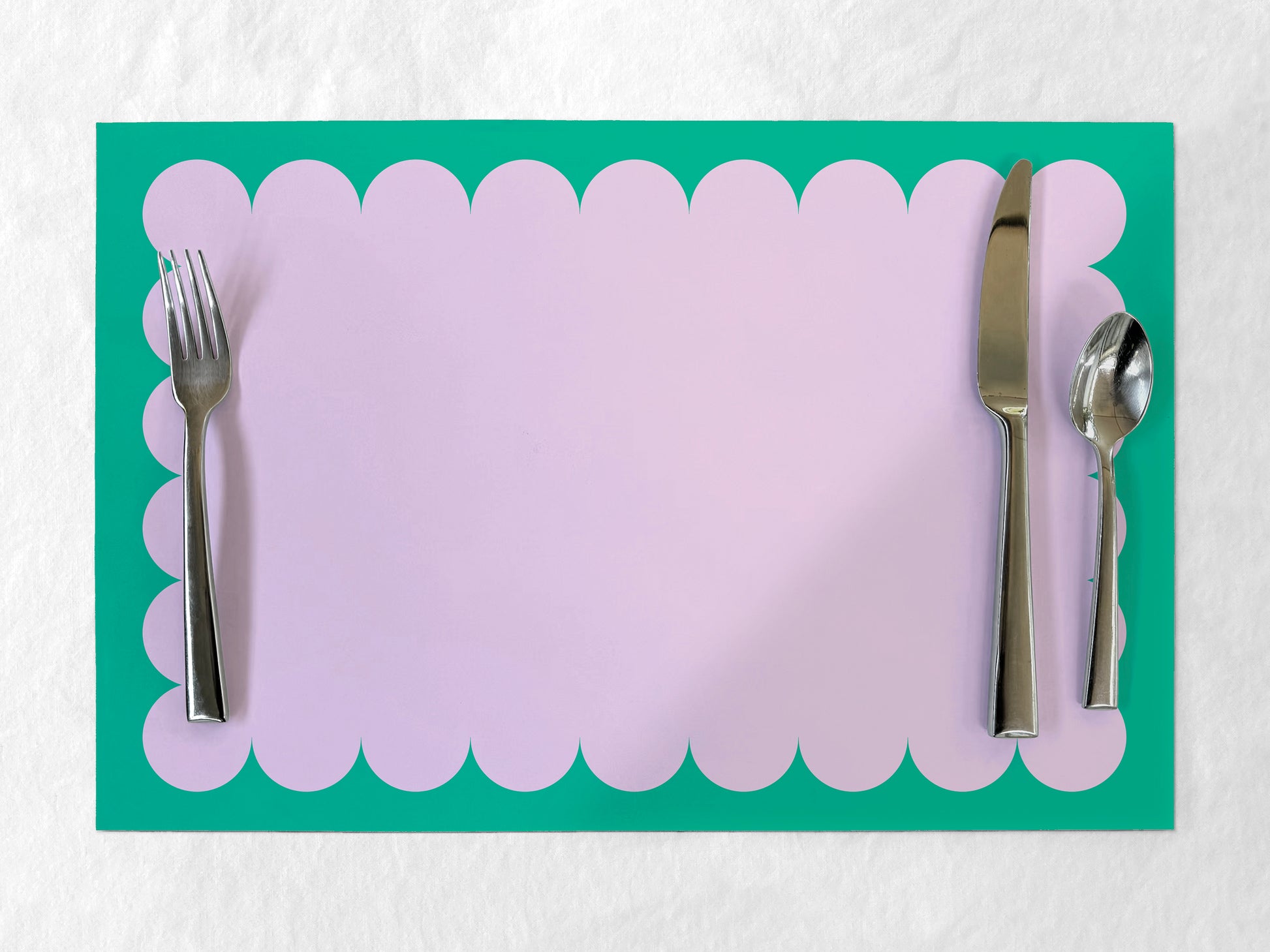 Paper placemat with scalloped edge, lavender and teal