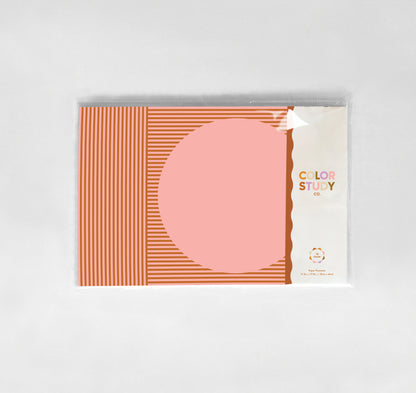Color study modern paper placemats with pink circle and orange stripes on a white background